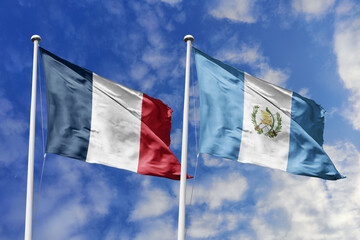 3d illustration. France and Guatemala Flag waving in sky. High detailed waving flag. 3D render....