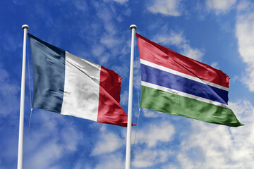 3d illustration. France and Gambia Flag waving in sky. High detailed waving flag. 3D render. Waving...