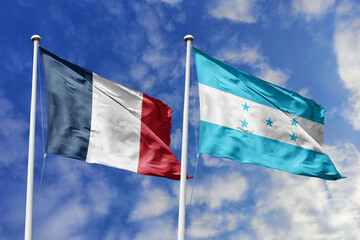 3d illustration. France and Honduras Flag waving in sky. High detailed waving flag. 3D render....