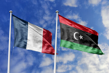 3d illustration. France and Libya Flag waving in sky. High detailed waving flag. 3D render. Waving in sky. Flags fluttered in the cloudy sky.