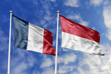 3d illustration. France and Monaco Flag waving in sky. High detailed waving flag. 3D render. Waving...