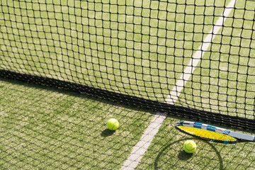 Tennis net on a green field - 796333875