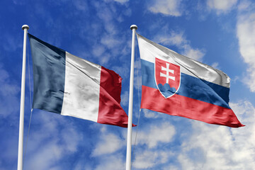 3d illustration. France and  Slovakia Flag waving in sky. High detailed waving flag. 3D render. Waving in sky. Flags fluttered in the cloudy sky.
