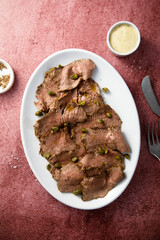 Homemade vitello tonnato with capers