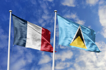 3d illustration. France and Saint Lucia Flag waving in sky. High detailed waving flag. 3D render. Waving in sky. Flags fluttered in the cloudy sky.