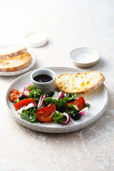 Kale salad with fresh vegetables