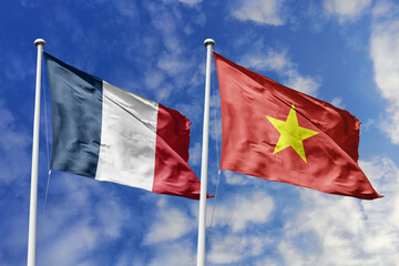3d illustration. France and Vietnam Flag waving in sky. High detailed waving flag. 3D render. Waving in sky. Flags fluttered in the cloudy sky.