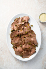 Homemade vitello tonnato with capers