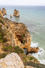 Cliffs of Ponta da Piedade during bad weather in Algarve, Portugal