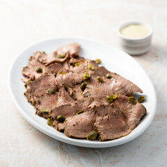 Homemade vitello tonnato with capers