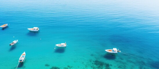 Fototapeta premium Several boats anchored in the ocean