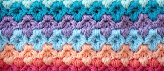 Fototapeta na wymiar Crochet stitch in vibrant rainbow hues