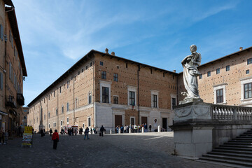 Fototapeta na wymiar Italy, 25 April 2024: Renaissance architecture in the historic center of Urbino, a UNESCO heritage site in the province of Pesaro and Urbino in the Marche region