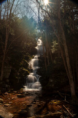 Fototapeta na wymiar Buttermilk Falls cascade down the mountain in northwest New Jersey