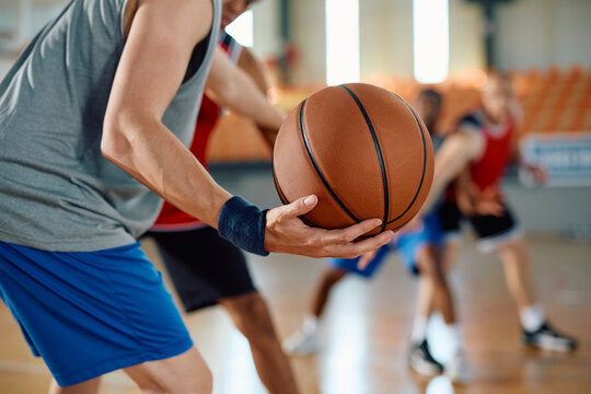 Close up of basketball player in action during sports match.