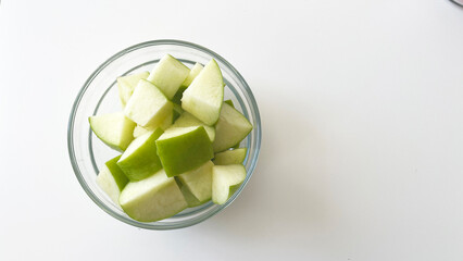 sliced green apple on white background - Powered by Adobe
