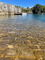 Clear water at the port of Mundaka, Spain, on a sunny day