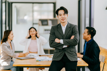 Business people meeting coworkers working together in boardroom, brainstorming, discussing and analyzing and planning business strategy