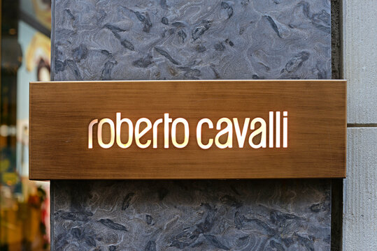 MILAN, ITALY &ndash; APRIL 11, 2024: Detail of the gable with golden logo in Via Monte Napoleone. Roberto Cavalli is a brand and was an Italian designer of luxury fashion clothing, perfume and accessories