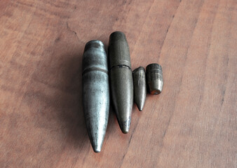 Fired projectiles of various calibers from various military weapons, from a pistol to a large-caliber machine gun