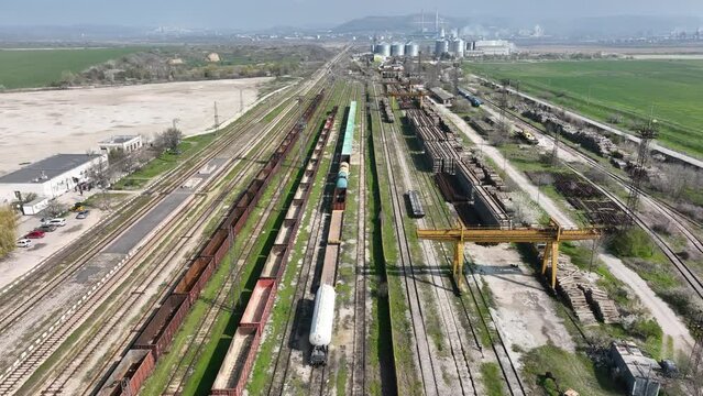  Freight trains. Cargo trains in industrial depot