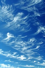 Obraz premium Serene panoramic view of blue sky with fluffy clouds as a beautiful natural background