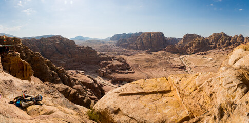 A view from above of the valley of the archeological site of Petra in Jordan with a view of the...