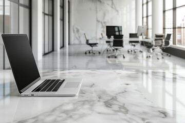 Modern workplace with an open laptop on a white marble table, mock-up, template