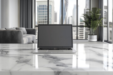 Fototapeta premium Modern workplace with an open laptop on a white marble table, mock-up, template