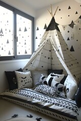 b"Black and white teepee in a child's room"