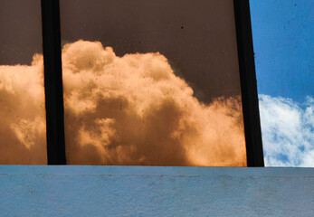 Skyline Canvases. Clouds Captured in Urban Frames. 