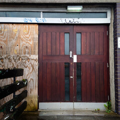 The entrance to an abandoned office building