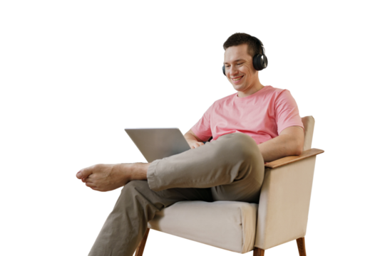 A male freelance programmer uses a laptop cut out