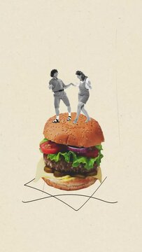 Stop motion, animation. Cheerful young people dancing on big delicious burger. Junk food lovers. Yummy break. Concept of retro style, creativity, surrealism, imagination. Copy space or ad, poster