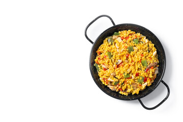 Yellow rice with chicken and vegetables isolated on white background. Top view. Copy space