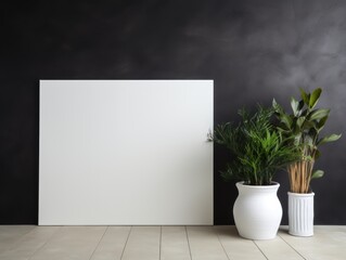empty white painting on a black wall with flowers