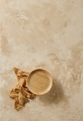 Wood plate on the textured background table style.