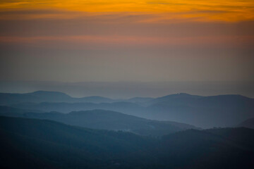 Sunset view over the rolling mountains and hills of serra de Monchique