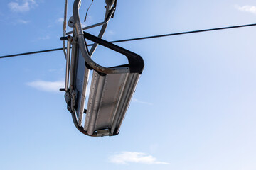 ski lift without people on a sunny day on the slope. Leisure. school break
