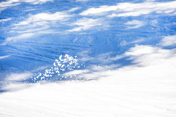 abstract background of a ski slope with snow from skis