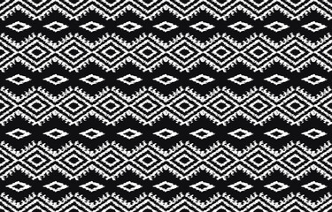 Geometrics Ikat ethnic design.Ikat seamless pattern in tribal, folk embroidery abstract wave art. ornament print. Ikat Design for wallpaper,carpet, clothing, fashion, fabric.	