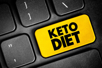 Keto diet, “Ketogenic” is a term for a low-carb diet. Get more calories from protein and fat and less from carbohydrates, text concept button on keyboard - 796519657