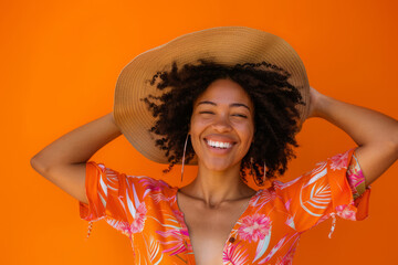 A smiling person dressed for warm weather happily removing their hat in greeting against an orange backdrop. This image evokes the carefree spirit of a summer holiday.