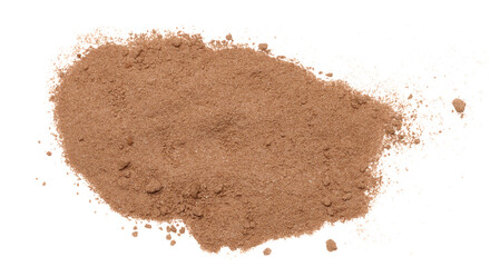 Dry ground cocoa powder scattered on an isolated background