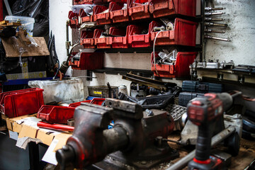 Garage. Car repair. Tools. Rubber tires, wheels.