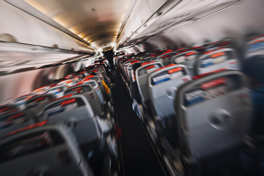 aerophobias concept. plane shakes during turbulence flying air hole. Blur image commercial plane moving fast downwards. Fear of flying. collapse slump, depression, downfall, debacle, subsidence.