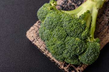 Fresh raw green broccoli in the form of a branch as an ingredient for cooking food at home