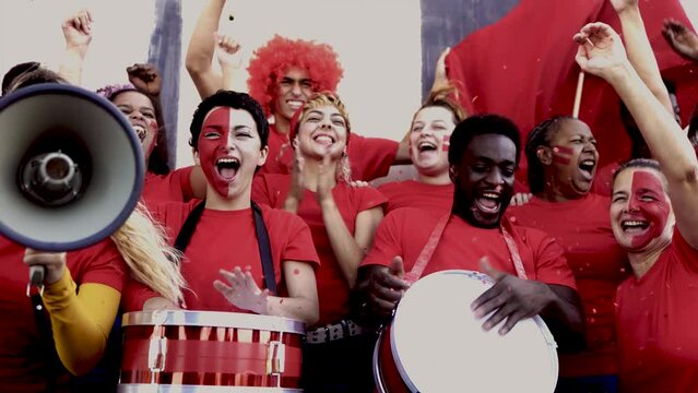 Sport fans support team in crowd stadium. Soccer or football people celebrate championship games at world event competitions