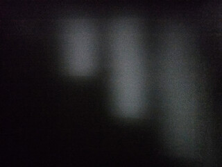 Light beam in the dark room.