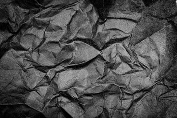Black Paper Texture background. Crumpled Black paper abstract shape background.